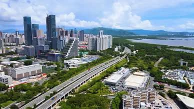 深圳京港粤高速公路航拍蓝天白云城市风光视频的预览图